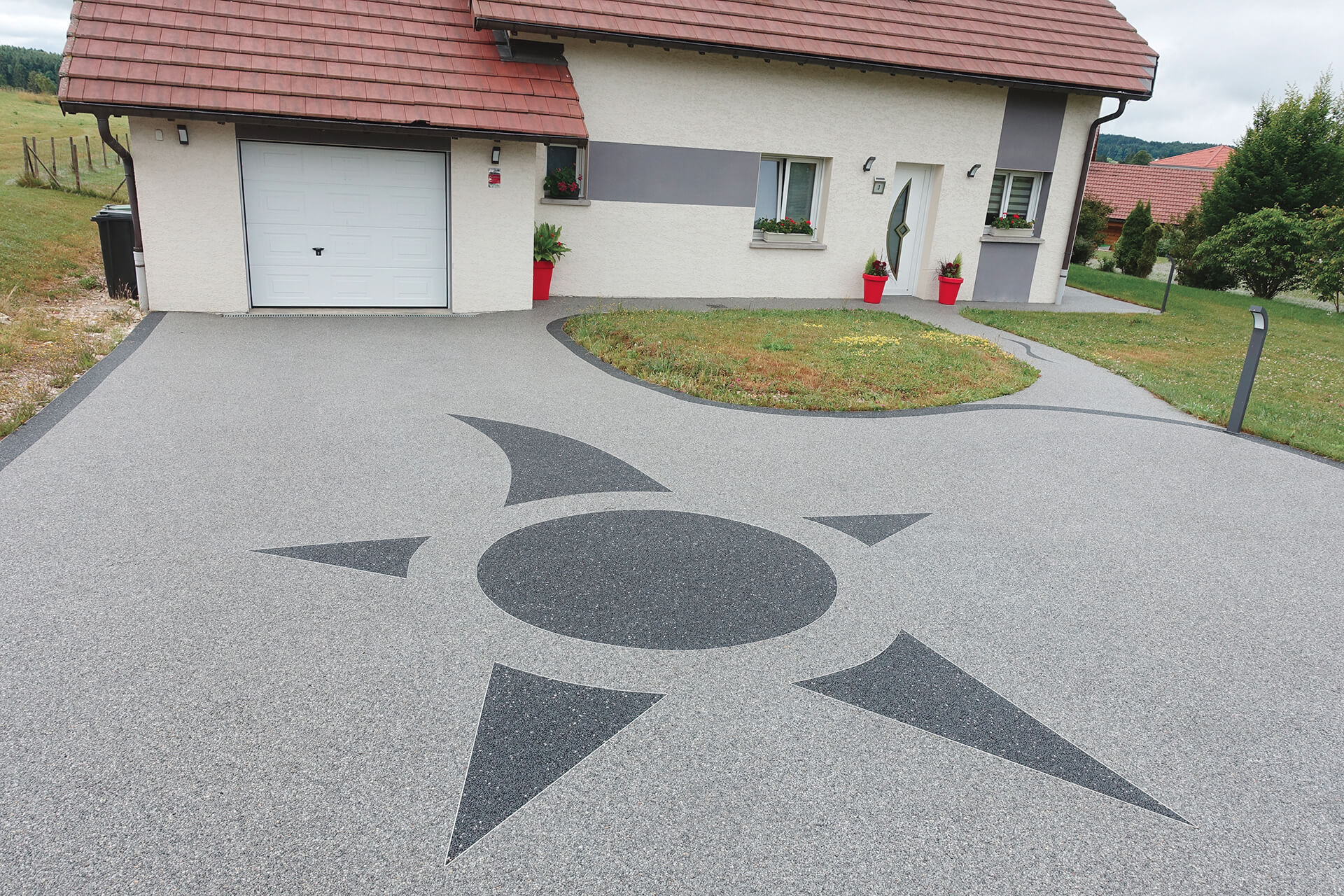 allée de garage en résine — réalisation Inspiration Résine
